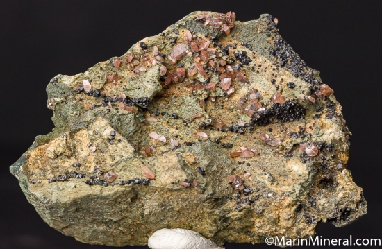 Titanite (pink!) with Melanite from MT Jeannes Pit No. 2, Clear Creek, San Benito Co., California, USA [db_pics/pics/CT843a.jpg]