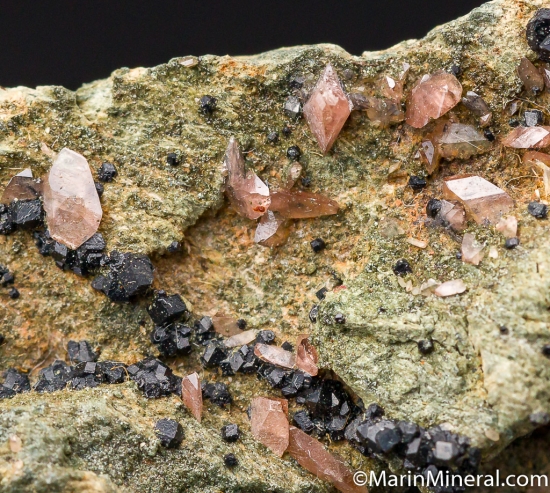 Titanite (pink!) with Melanite from MT Jeannes Pit No. 2, Clear Creek, San Benito Co., California, USA [db_pics/pics/CT843d.jpg]