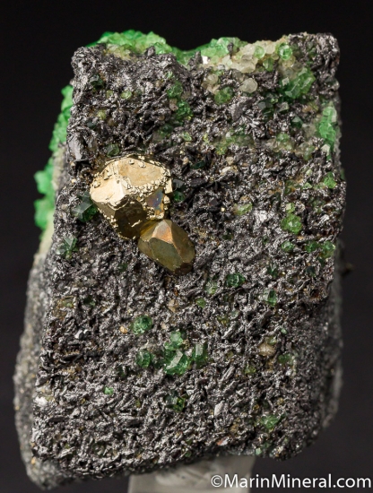 Tsavorite, Pyrite on Graphite from Merelani Hills, Arusha, Tanzania [db_pics/pics/D576c.jpg]