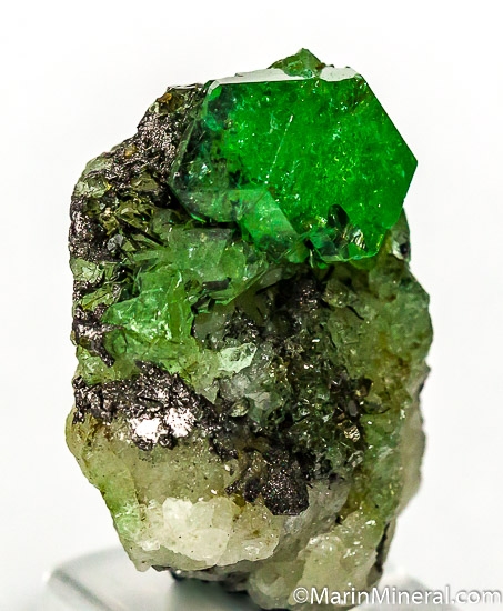 Tsavorite on Graphite from Merelani Hills, Arusha, Tanzania [db_pics/pics/J642b.jpg]