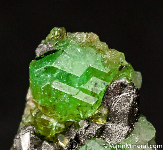 Tsavorite on Graphite from Merelani Hills, Arusha, Tanzania [db_pics/pics/J663c.jpg]