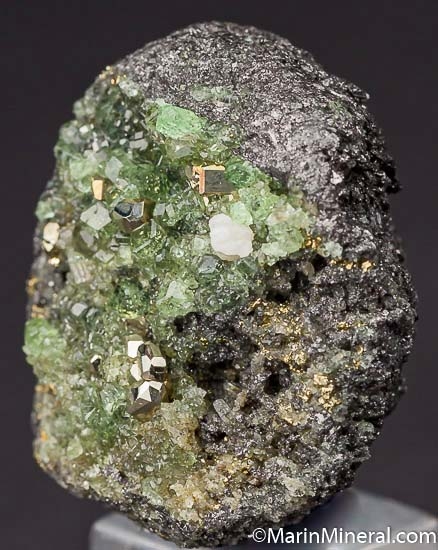 Tsavorite, Pyrite on Graphite from Merelani Hills, Arusha, Tanzania [db_pics/pics/K250b.jpg]