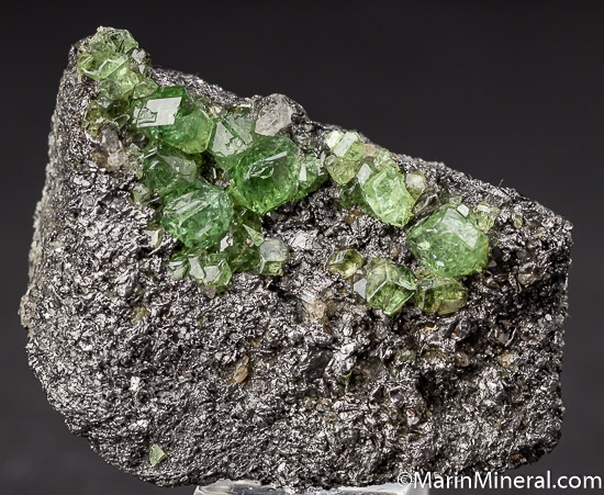 Tsavorite on Graphite from Merelani Hills, Arusha, Tanzania [db_pics/pics/K321a.jpg]