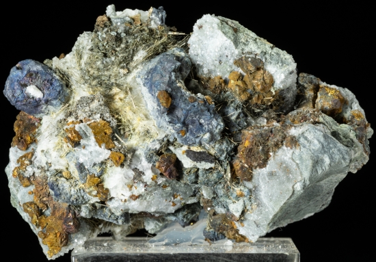 Millerite on Calcite from Sheefry Mine, Co. Mayo, Ireland [db_pics/pics/LV202a.jpg]