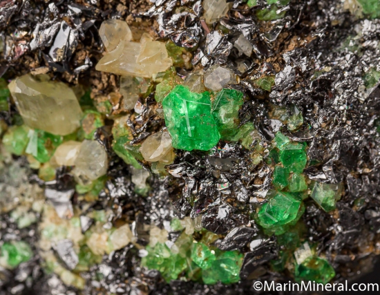 Tsavorite, Diopside, on Graphite from Merelani Hills, Arusha, Tanzania [db_pics/pics/M538d.jpg]