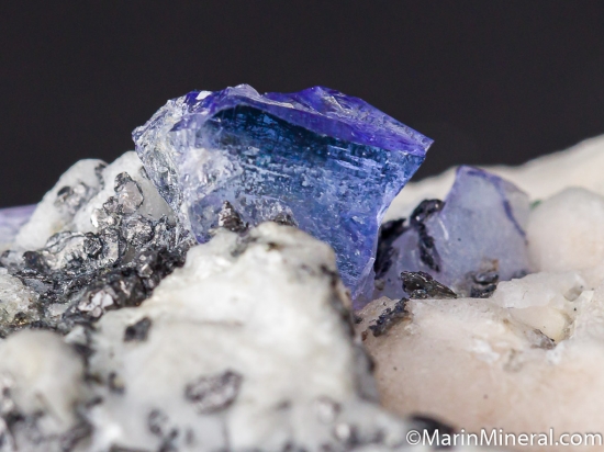 Graphite, Apatite in Calcite with Tanzanite from Merelani Hills, Arusha, Tanzania [db_pics/pics/M759d.jpg]