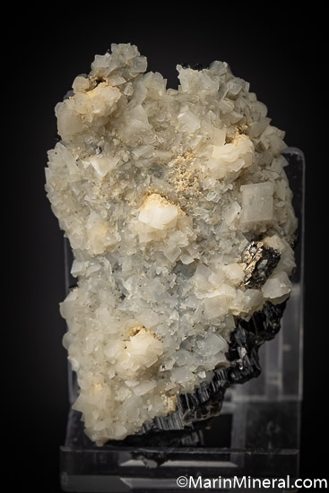 Calcite on Ferberite from Panasquiera, Portugal [db_pics/pics/SM498b.jpg]