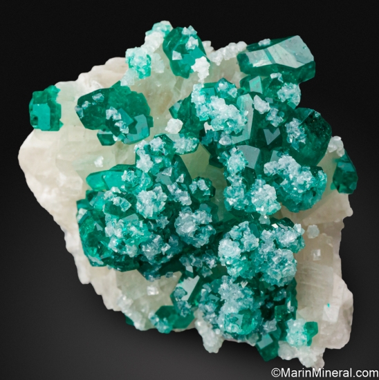 Dioptase on Calcite from Tsumeb, Namibia [db_pics/pics/ST561a.jpg]