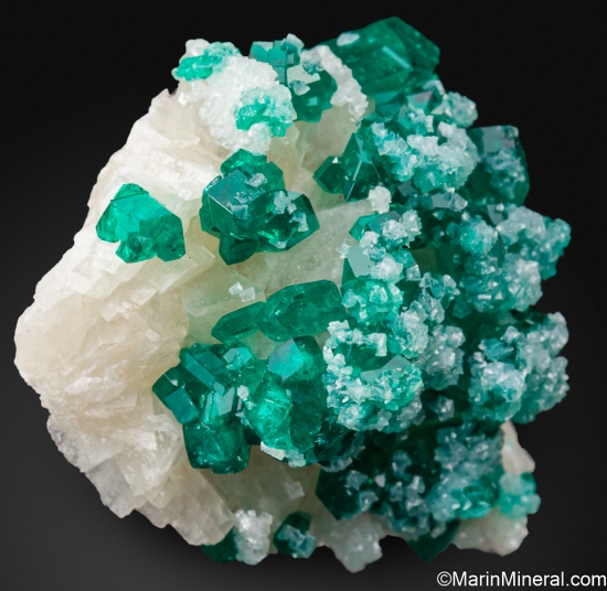 Dioptase on Calcite from Tsumeb, Namibia [db_pics/pics/ST561c.jpg]