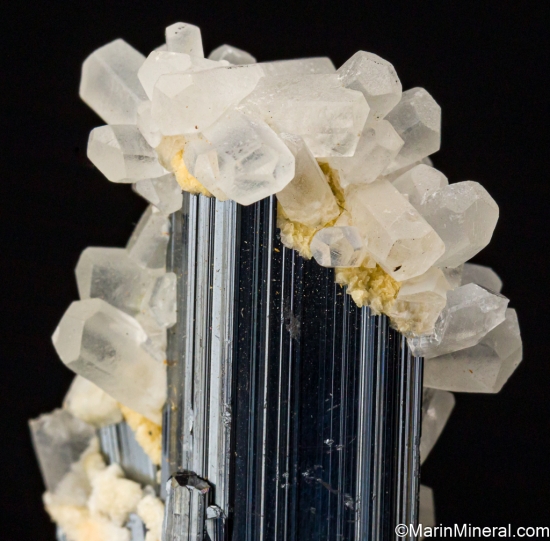 Calcite on Stibnite from Henan Prov., China [db_pics/pics/ST565f.jpg]