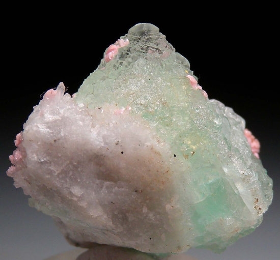 Rhodochrosite on Fluorite from Sunnyside Mine, Silverton, San Juan Co., Colorado, USA [db_pics/pics/ab103b.jpg]