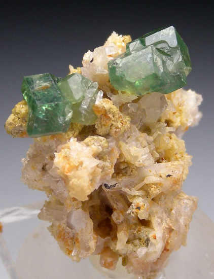 Demantoid Garnet on Quartz from Erongo Mountains, Namibia [db_pics/pics/af485d.jpg]