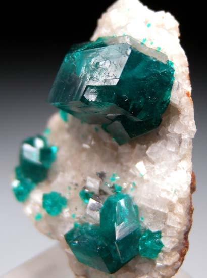 Dioptase on Calcite from Tsumeb, Namibia [db_pics/pics/c253b.jpg]