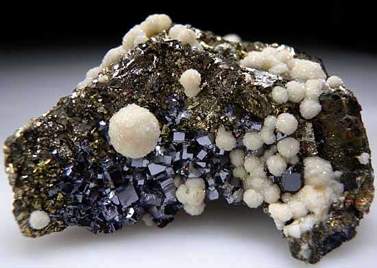 Dolomite, Galena, Sphalerite on Pyrite psuedo. Pyrrhotite from Trepca Mine, Stanterg, Kosovo [db_pics/pics/e598a.jpg]