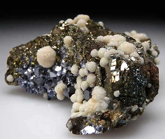 Dolomite, Galena, Sphalerite on Pyrite psuedo. Pyrrhotite from Trepca Mine, Stanterg, Kosovo [db_pics/pics/e598c.jpg]