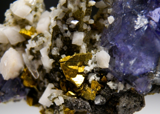 Fluorite, Chalcopyrite on Quartz from Yaogangxian Mine, Hunan, China [db_pics/pics/lp570d.jpg]