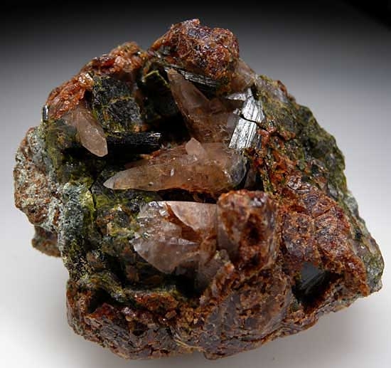 Epidote with Garnet included Quartz from Garnet Hill Mine, Calaveras Co., California [db_pics/pics/na613a.jpg]