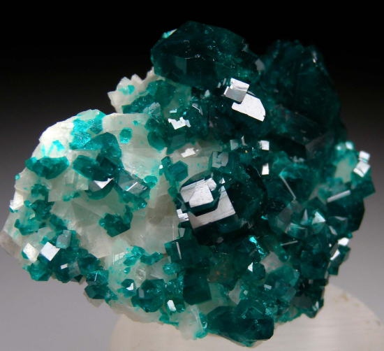 Dioptase on Calcite from Tsumeb, Namibia [db_pics/pics/p570c.jpg]