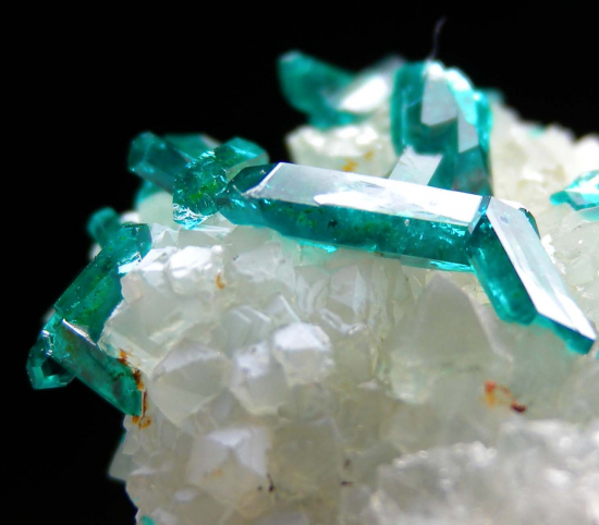 Dioptase on Quartz from Sanda Mine, Mindouli District, Pool Department, Rep. of Congo [db_pics/pics/r622d.jpg]