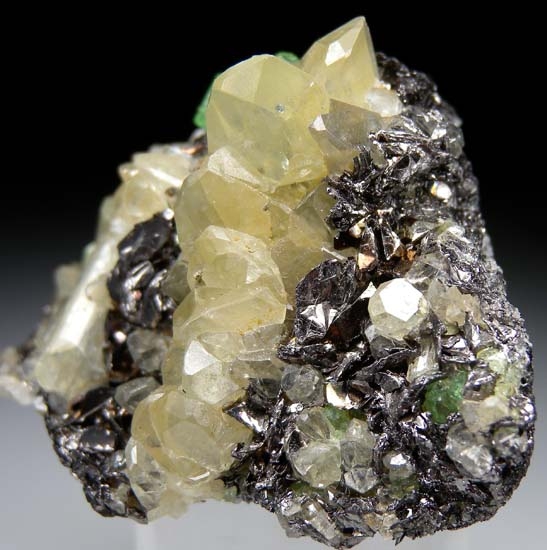 Tsavorite, Diopside on Graphite from Merelani Hills, Arusha, Tanzania [db_pics/pics/t553b.jpg]