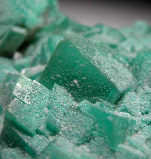 Calcite included by Dioptase from Tsumeb, Namibia [db_pics/pics/ts203d.jpg]