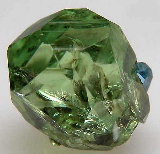 Apatite on Tsavorite from Merelani Hills, Lelatema Mtns., Arusha Region, Tanzania [db_pics/pics/tsv9c.jpg]