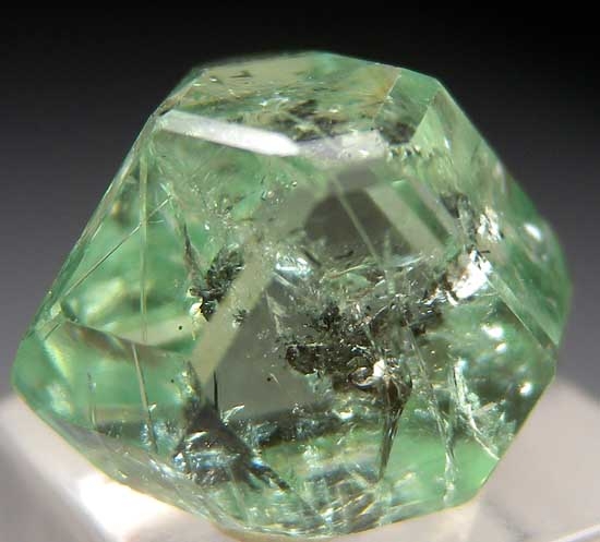 Tsavorite included by Graphite from Merelani Hills, Arusha, Tanzania [db_pics/pics/tz410c.jpg]